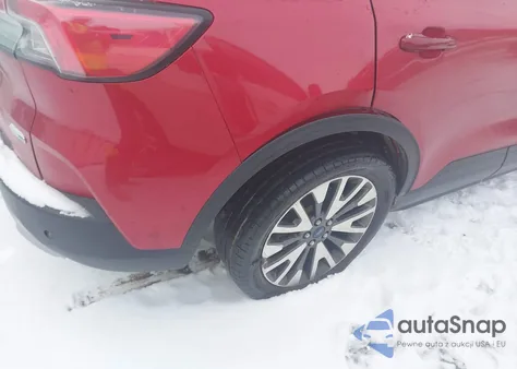 2020 Ford Escape Titanium z USA, uszkodzony, nr VIN 1FMCU9J92LUA20519